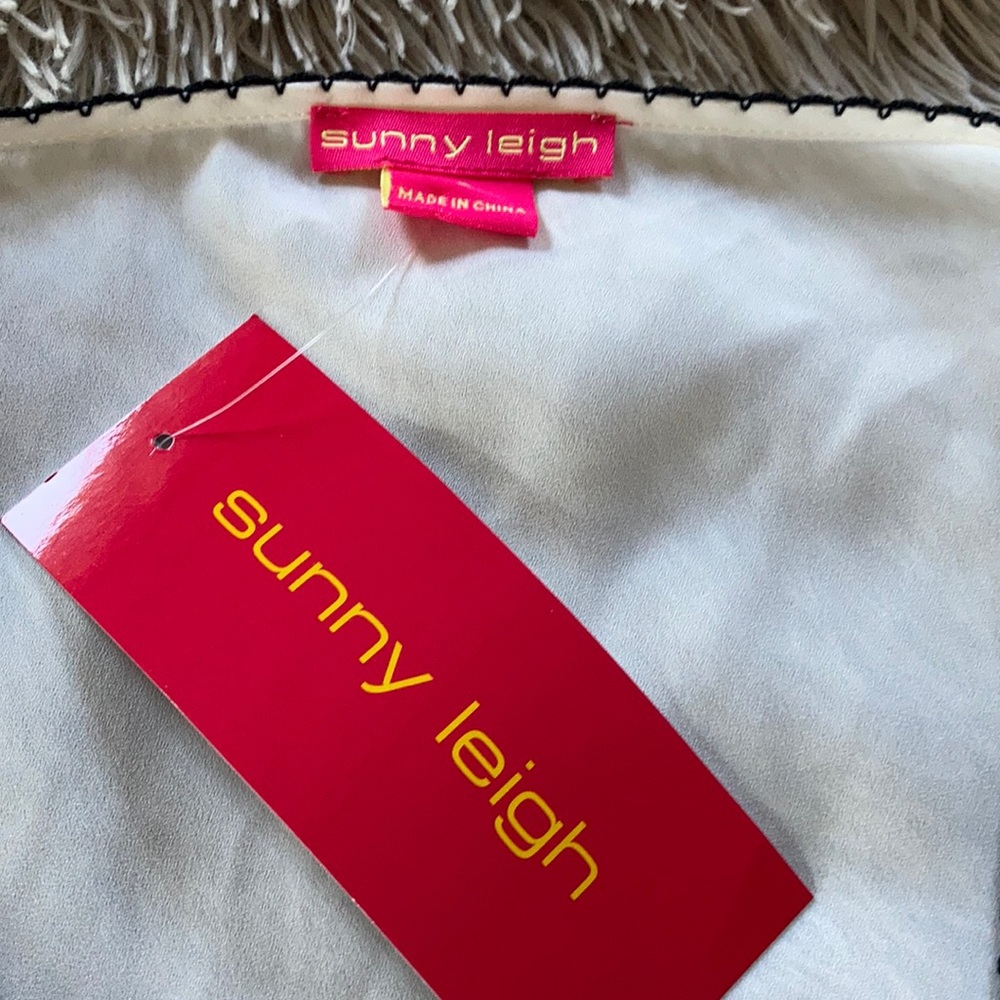 NWT off-white flouncy blouse with black piping